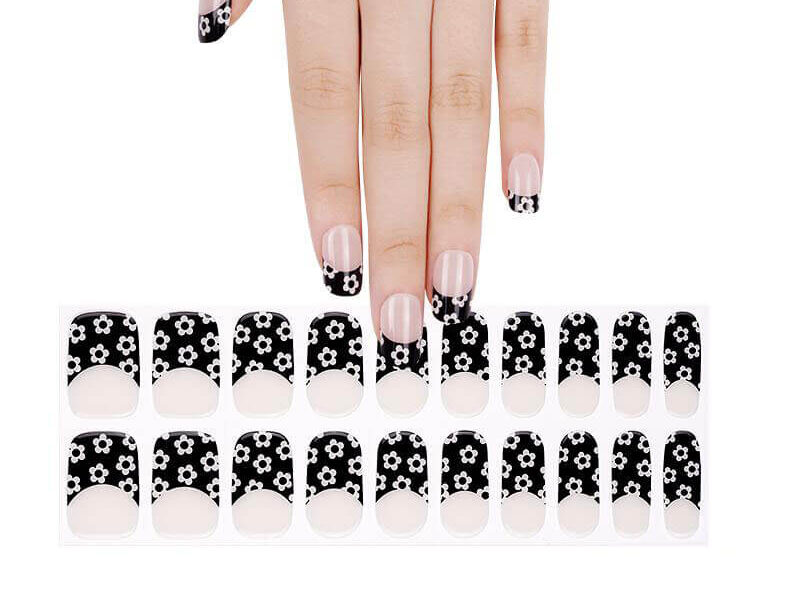 Black french tip nails with floral design semi-cured as gel nail stickers